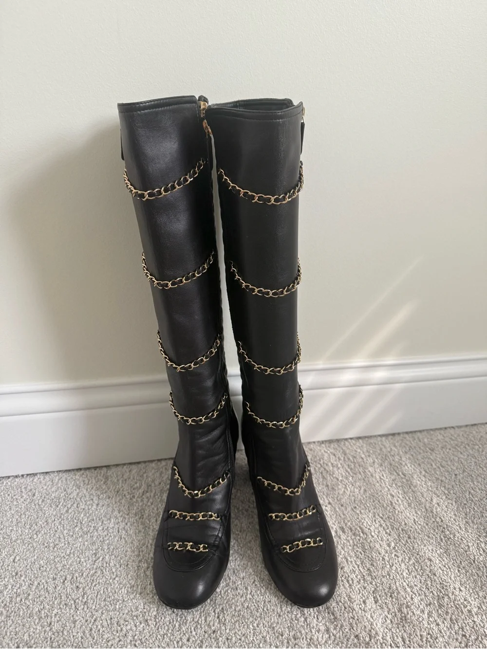 CHANEL Black knee-high lambskin leather boots